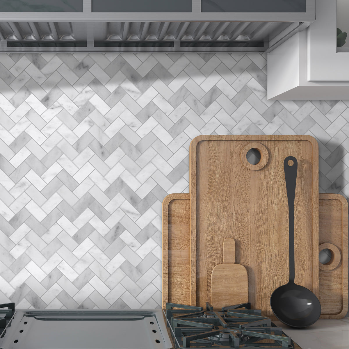 11.6" x 11.1" Carrara White Herringbone Peel and Stick backsplash