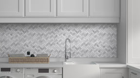 11.6" x 11.1" Carrara White Herringbone Peel and Stick backsplash